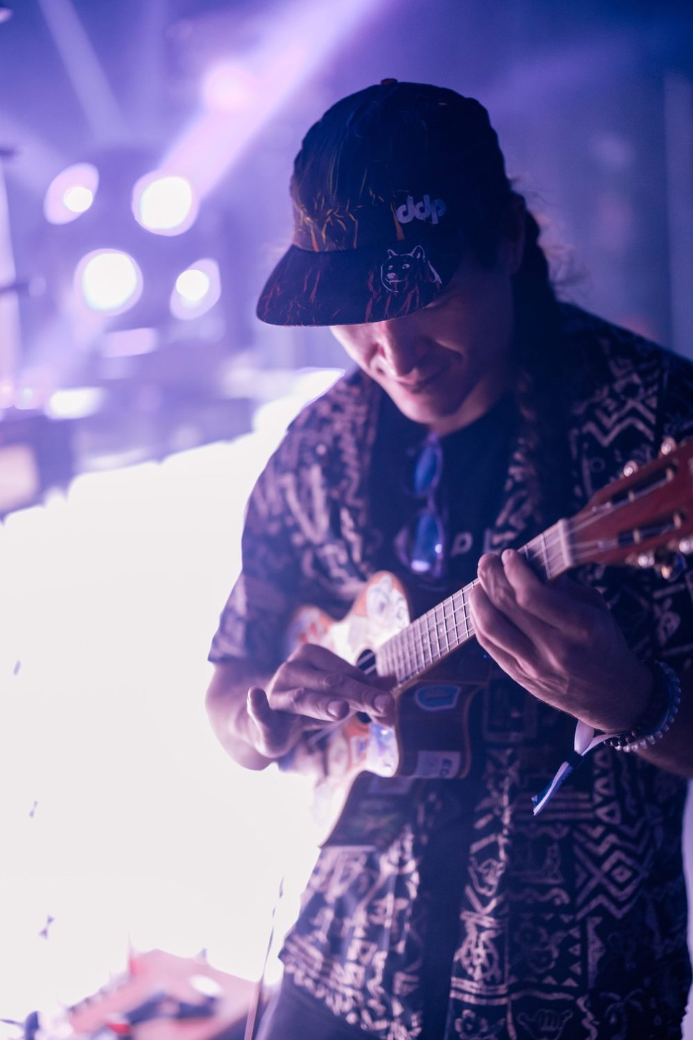 Shaka smiling with his ukulele